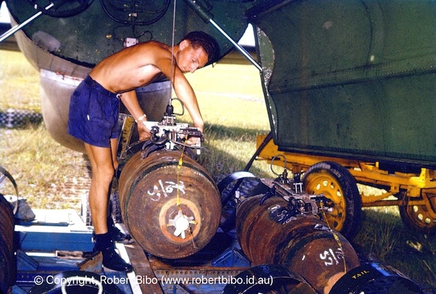 Preparing bombs and loading.